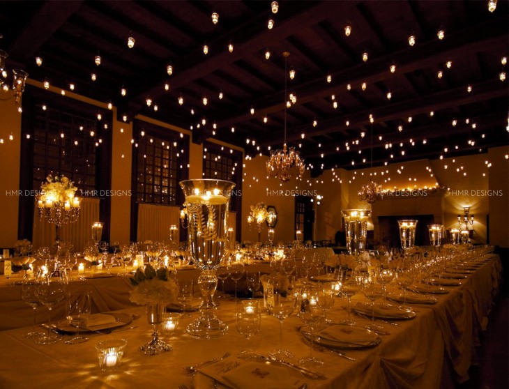 candlelight-on-tabletops-and-ceiling-for-an-amber-glow-at-a-chicago-wedding